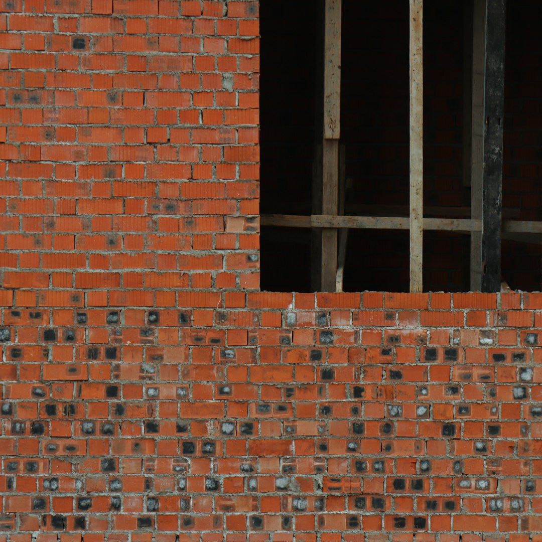 a brick wall with a window